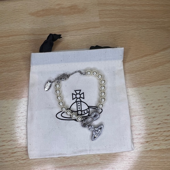 Vivienne Westwood Jewelry - Vivienne Westwood Silver Orb Safety Pin Pear Bracelet